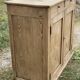 Small Parisian buffet with 2 doors and 2 drawers in light wood.