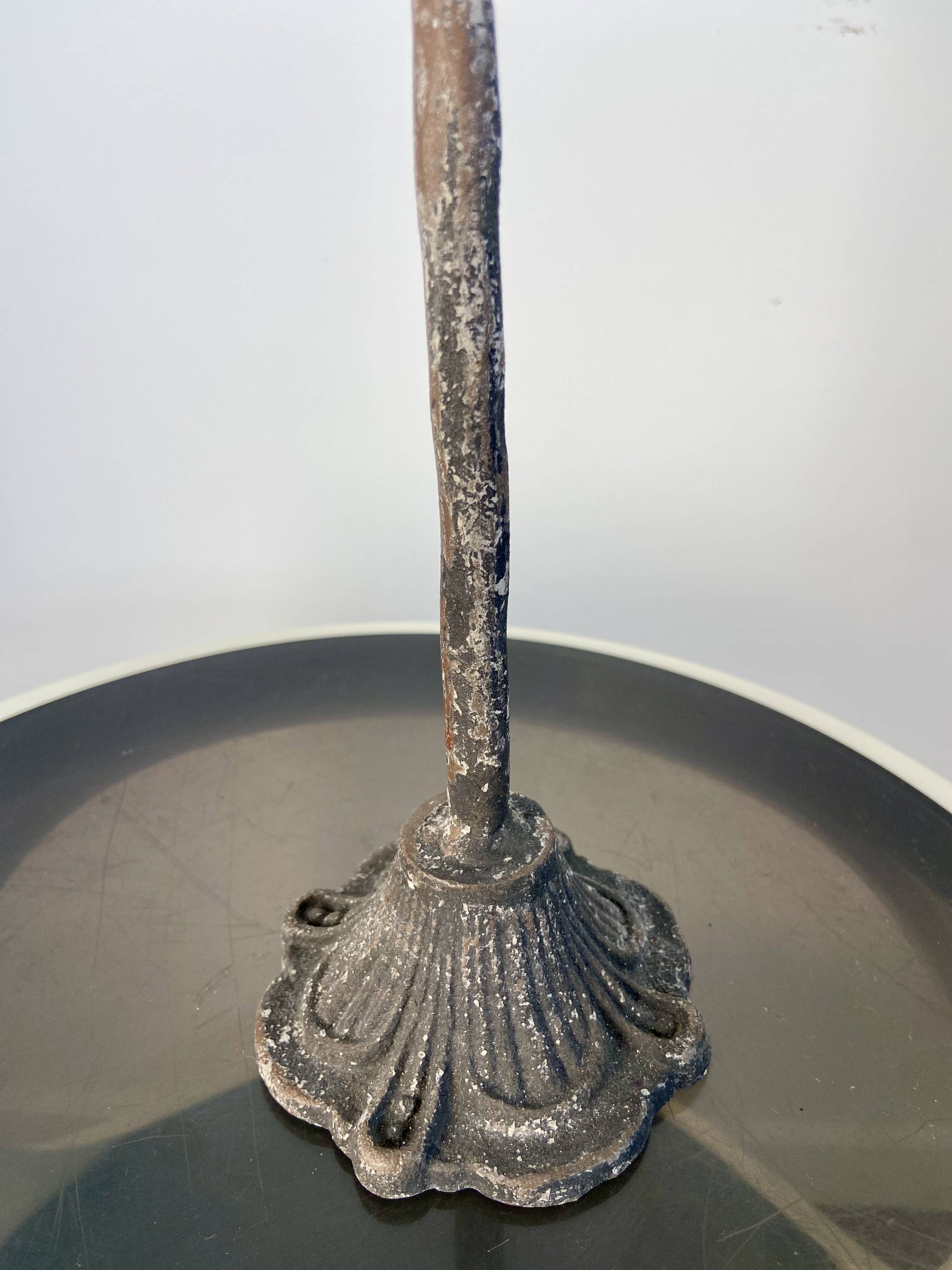 Metal pine cone candle holder