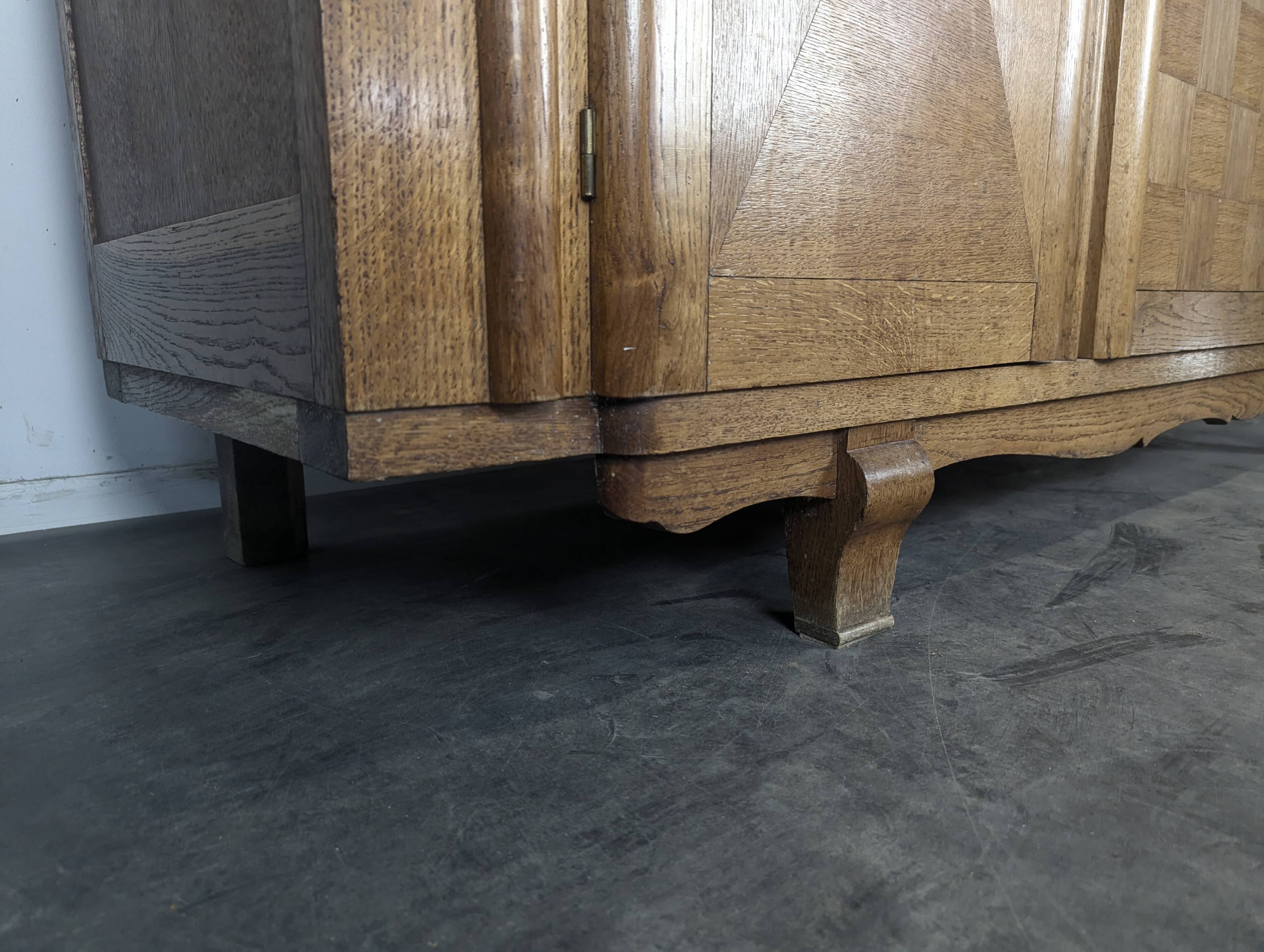 Art Deco oak enfilade with checkerboard marquetry, three doors, 1940s.
