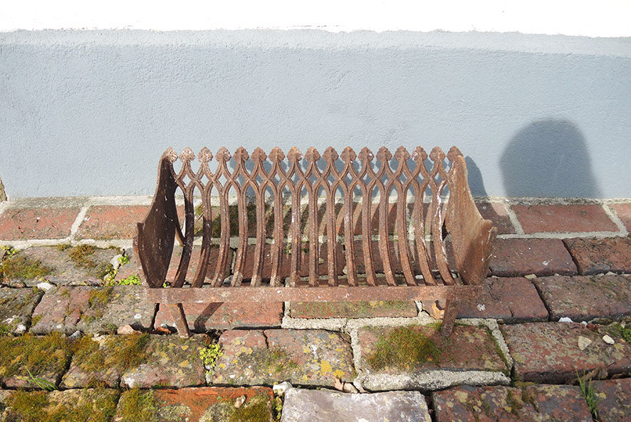 Old gate cradle with cast iron logs