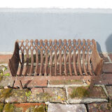 Old gate cradle with cast iron logs