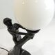 Art Deco lamp woman holding a luminous globe – Vintage resin lamp – L