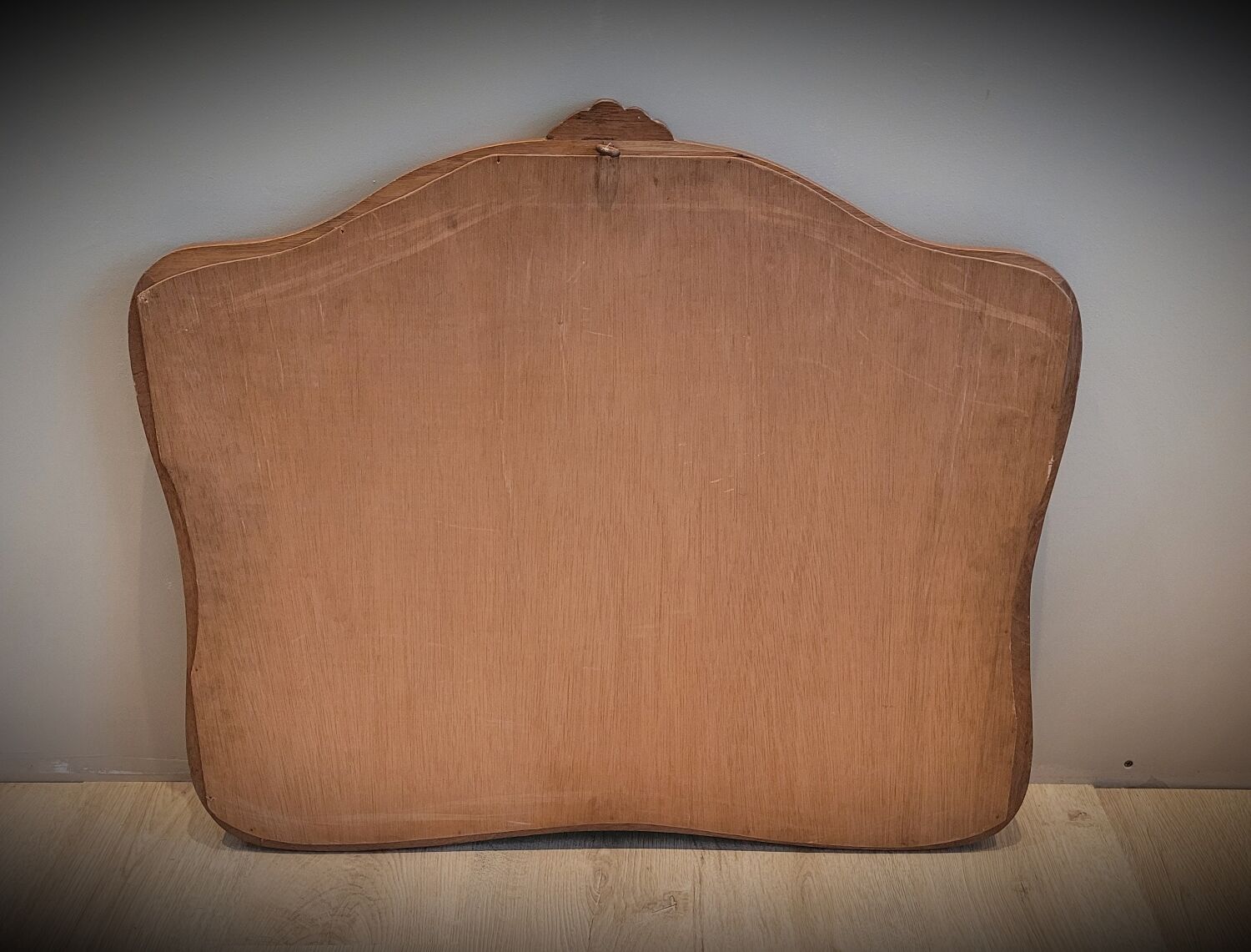 Elongated wooden mirror