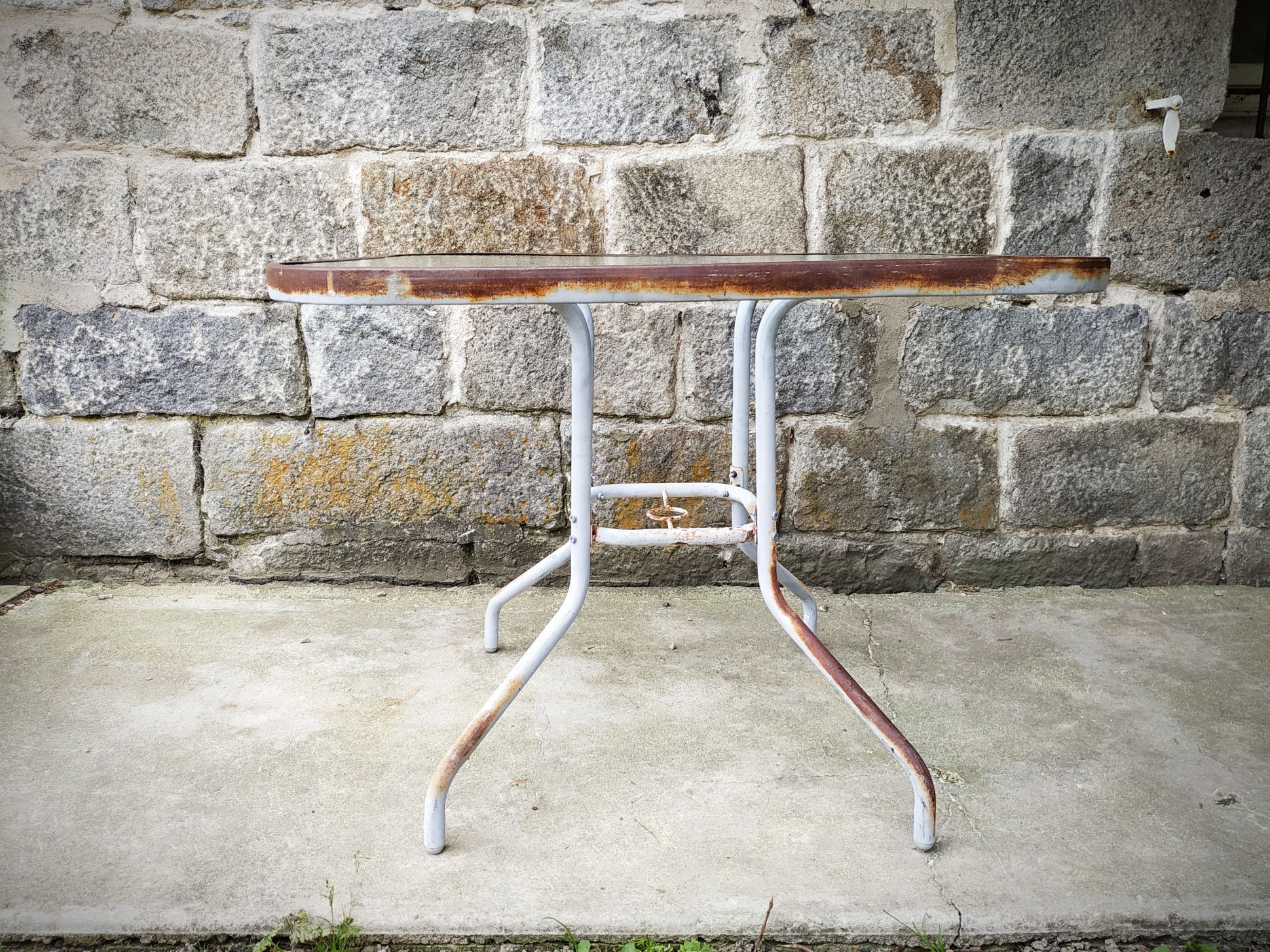 Old garden pedestal table