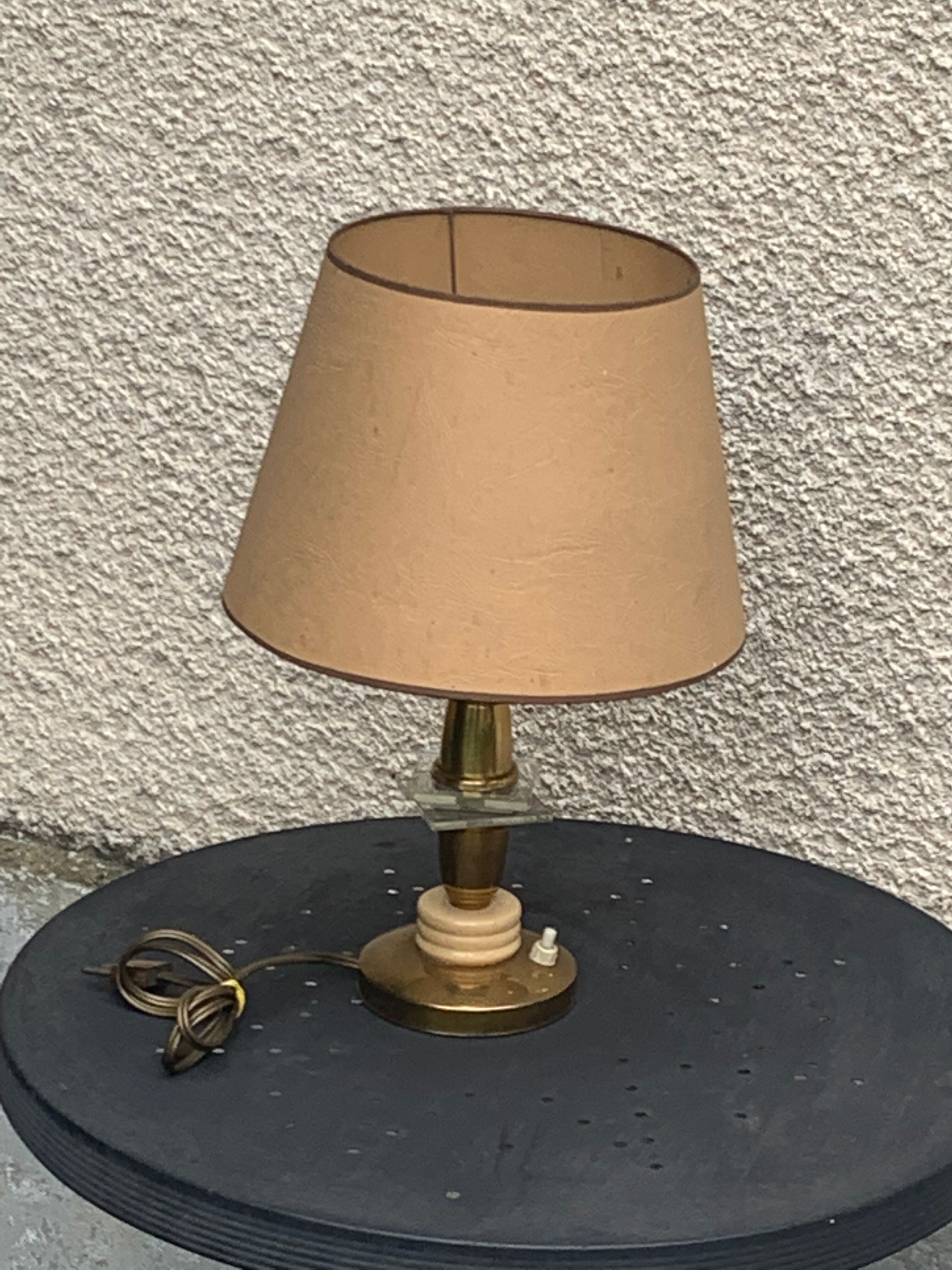 Table lamp in gilded metal, bakelite and antique plexiglass