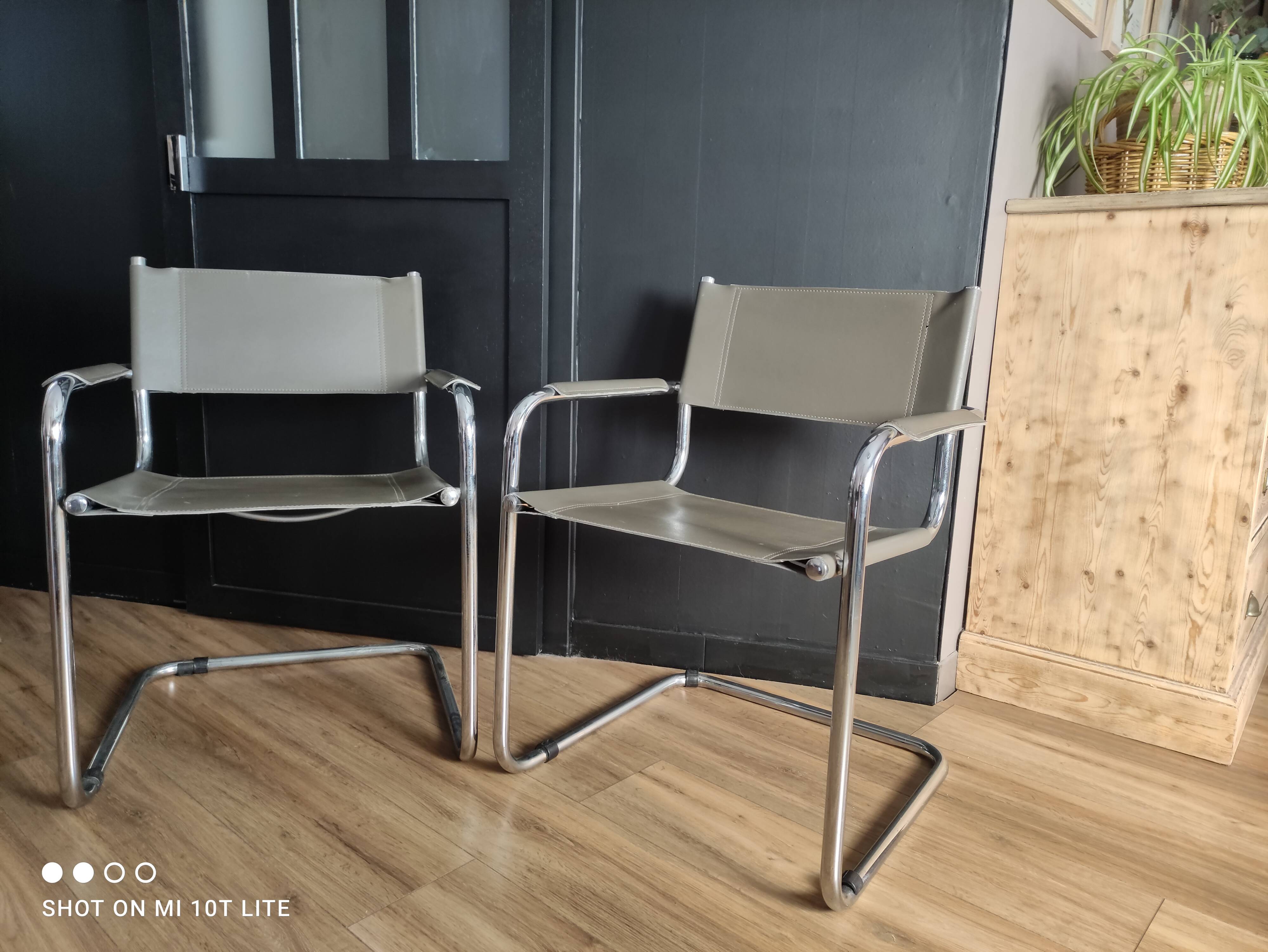 Pair of taupe Cantilever armchairs with chrome base