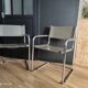 Pair of taupe Cantilever armchairs with chrome base