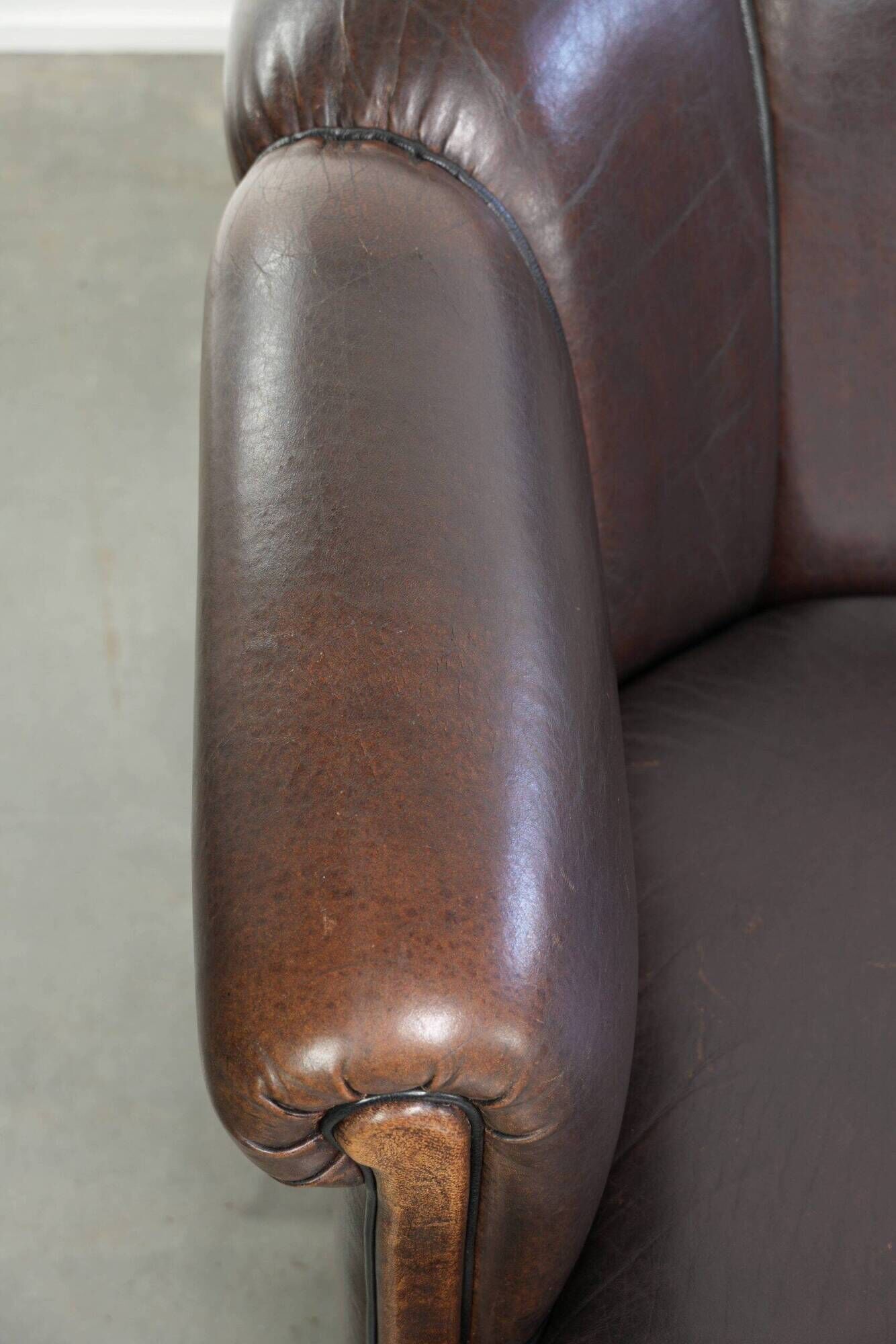 Set of a sheepskin sofa together with its matching club armchair