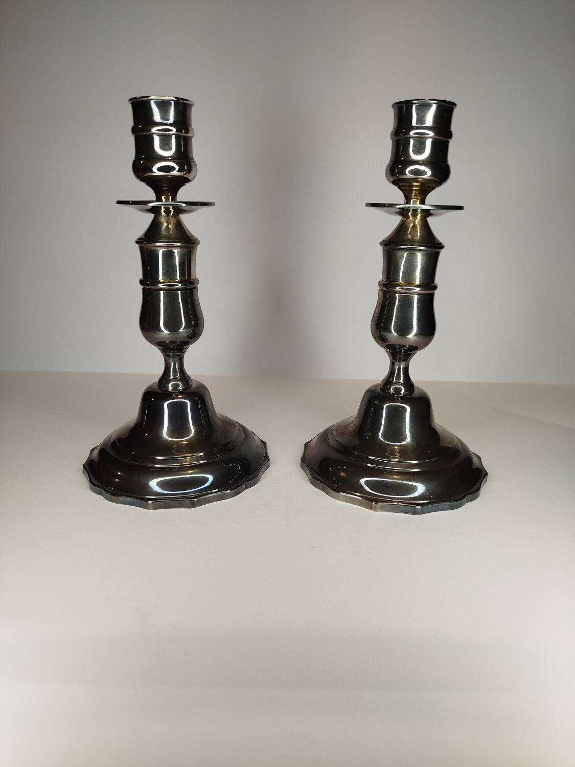 Pair of Saint Medard candlesticks