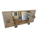 Wall-mounted coat rack with a patinated mirror