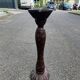 Round candle holder in turned carved wood
