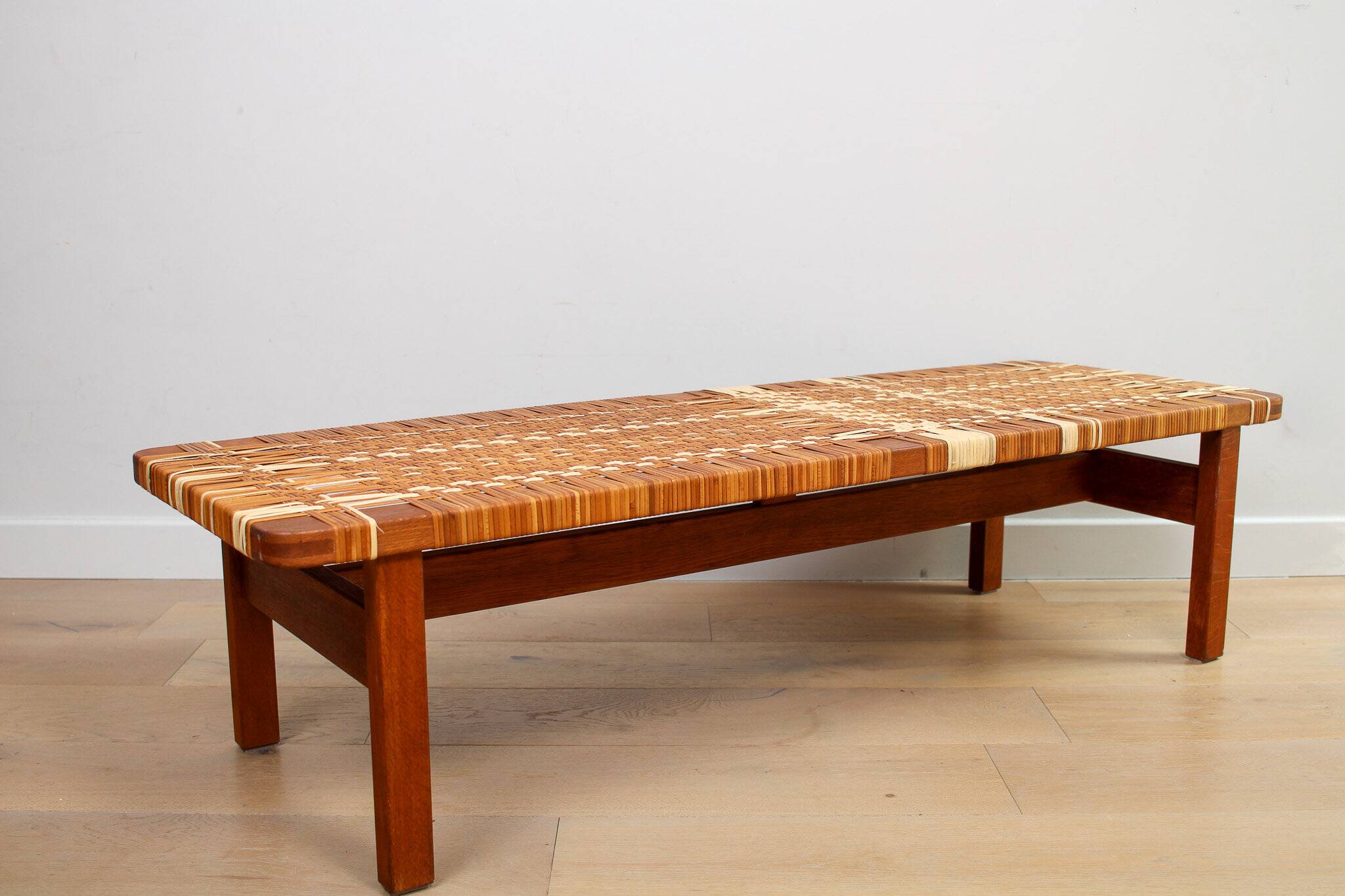 A vintage mid-century Danish Borge Mogensen 5272 rattan coffee table/bench