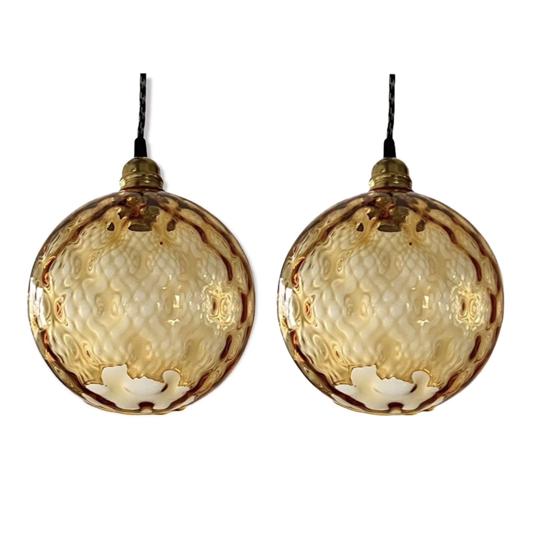 Set of two vintage amber glass pendant lamps electrified to nine