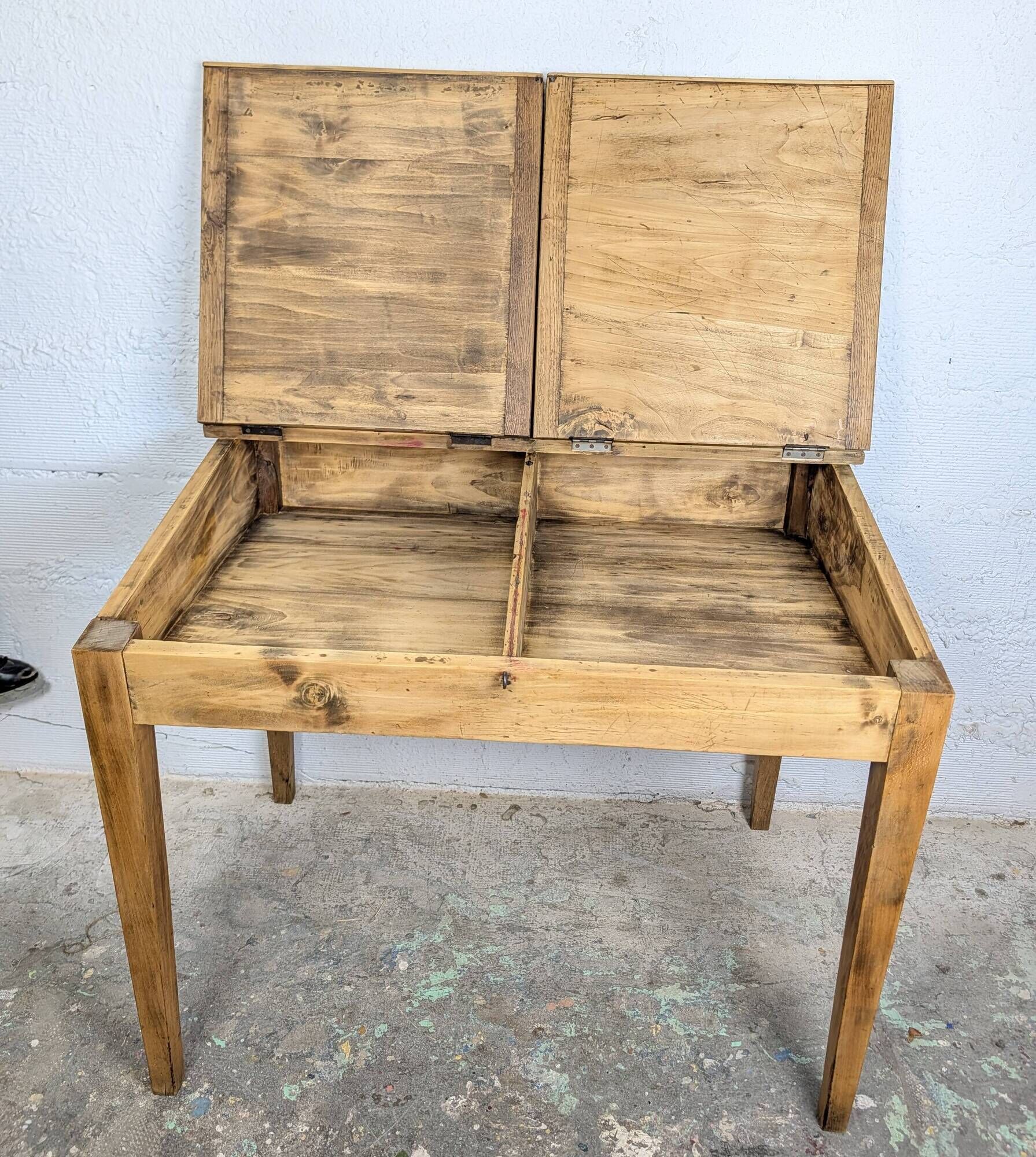 Antique wooden school desk with double lift-up tops.
