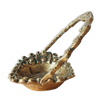 Empty bronze basket pocket with gallant stage décor