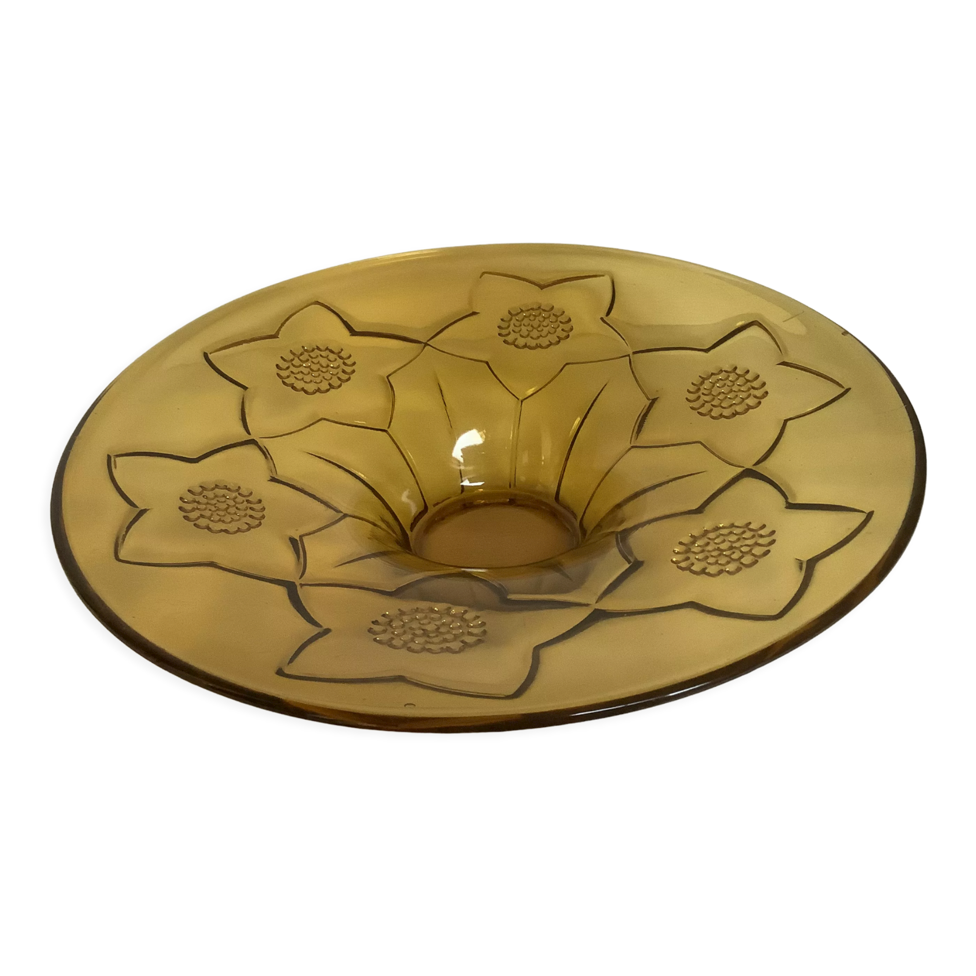 Yellow glass cup with a floral pattern