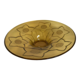 Yellow glass cup with flower pattern