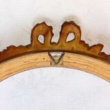 Oval frame with gilded pediments 19th wood and stucco