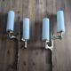 Pair of Arlus gilt bronze and opaline wall sconces