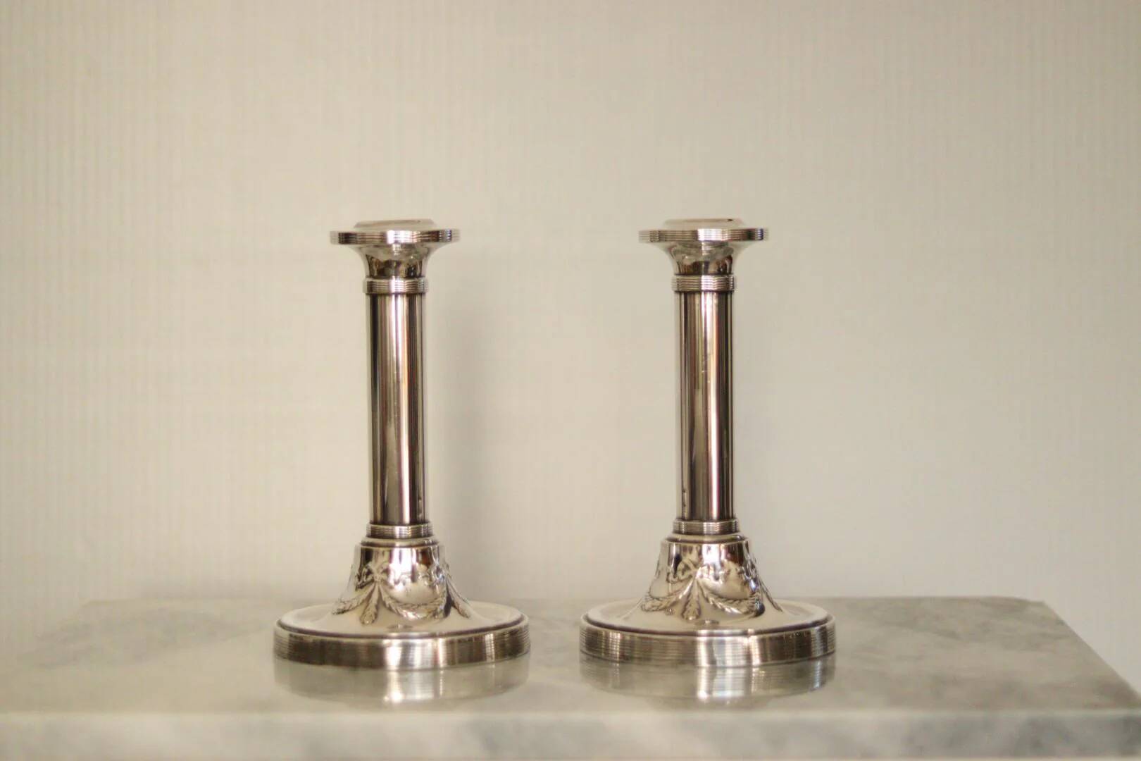 Pair of mid-century silver-plated metal candleholders