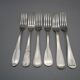 6 mismatched old silver metal forks for a chic table