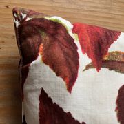 Vintage cushion with virgin vine leaf pattern.