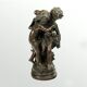 Bronze statue of two children carrying a bouquet of flowers, signed Auguste Moreau (1834-1917)