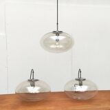 Suspended UFO-shaped glass luminaires in mid-century German Space Age style, set of 3.