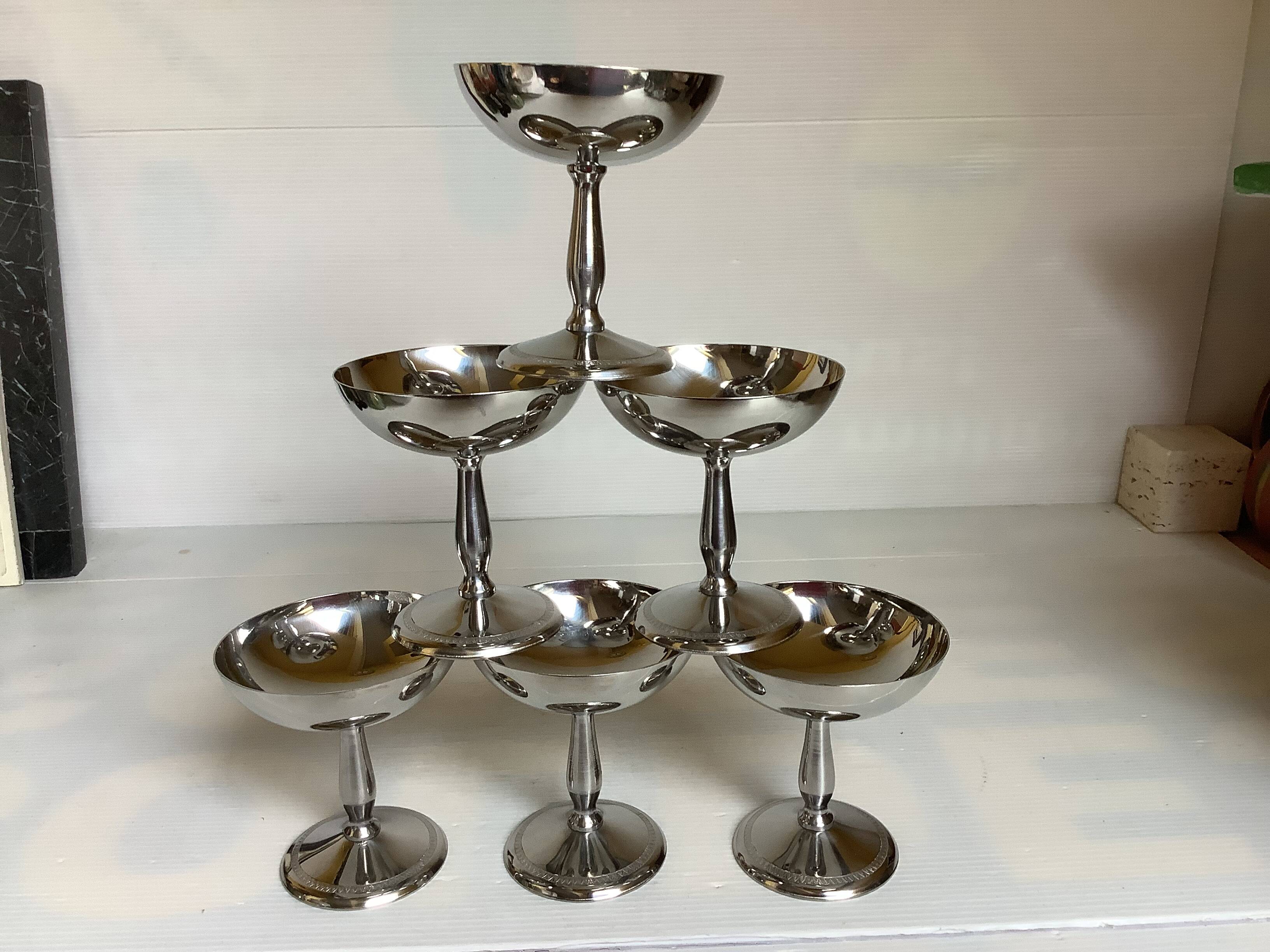 6 footed bowls with a silver metal ice frieze