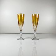 Yellow colored crystal champagne coupe duo