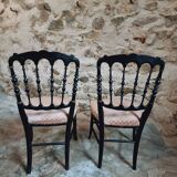 Pair of antique Napoleon III chairs in blackened wood and fabric