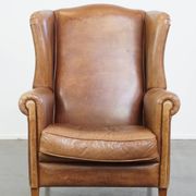 Cowhide Leather Wingback Chair in Light Cognac Color