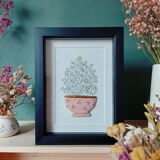Composition forget-me-nots in a clay strainer