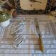 Silver metal horse-shaped knife rests