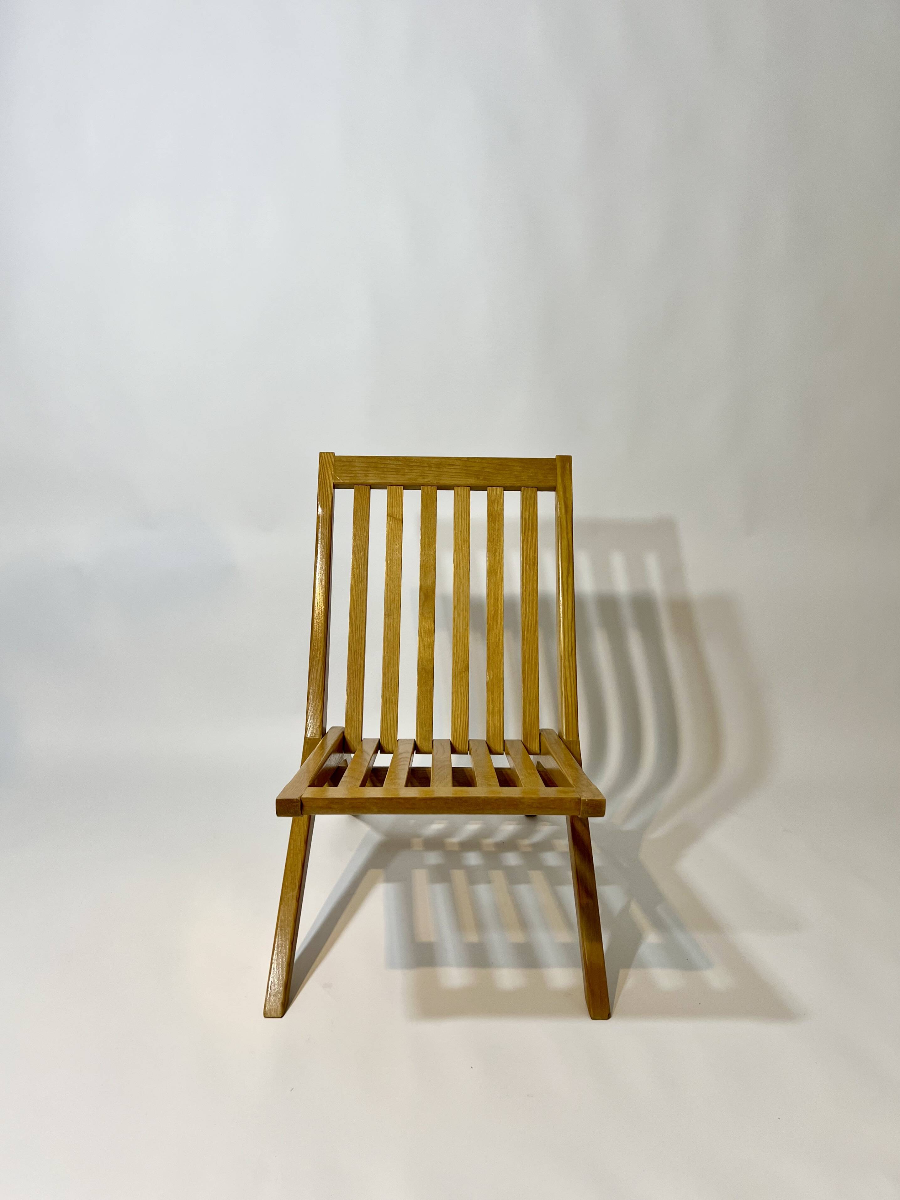 Vintage design solid wood scissor chairs from the 1970s