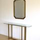 Modernist brass and glass console table & mirror. 1970s