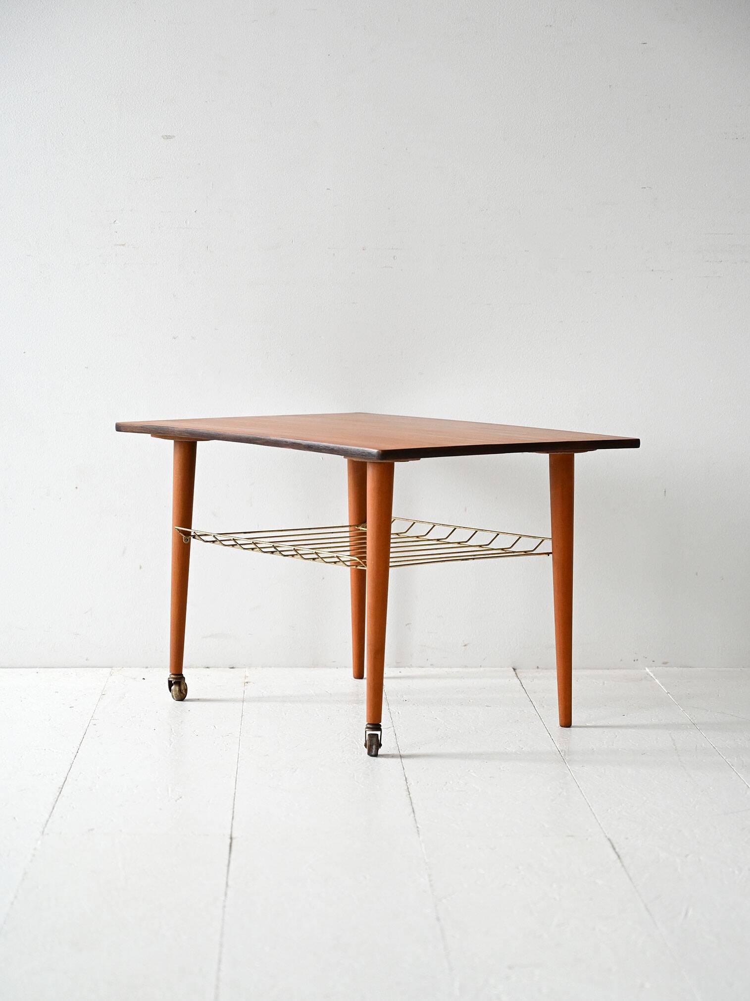 Vintage Scandinavian coffee table in teak with brass shelf
