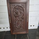 Ancienne porte en bois sculpté en chêne