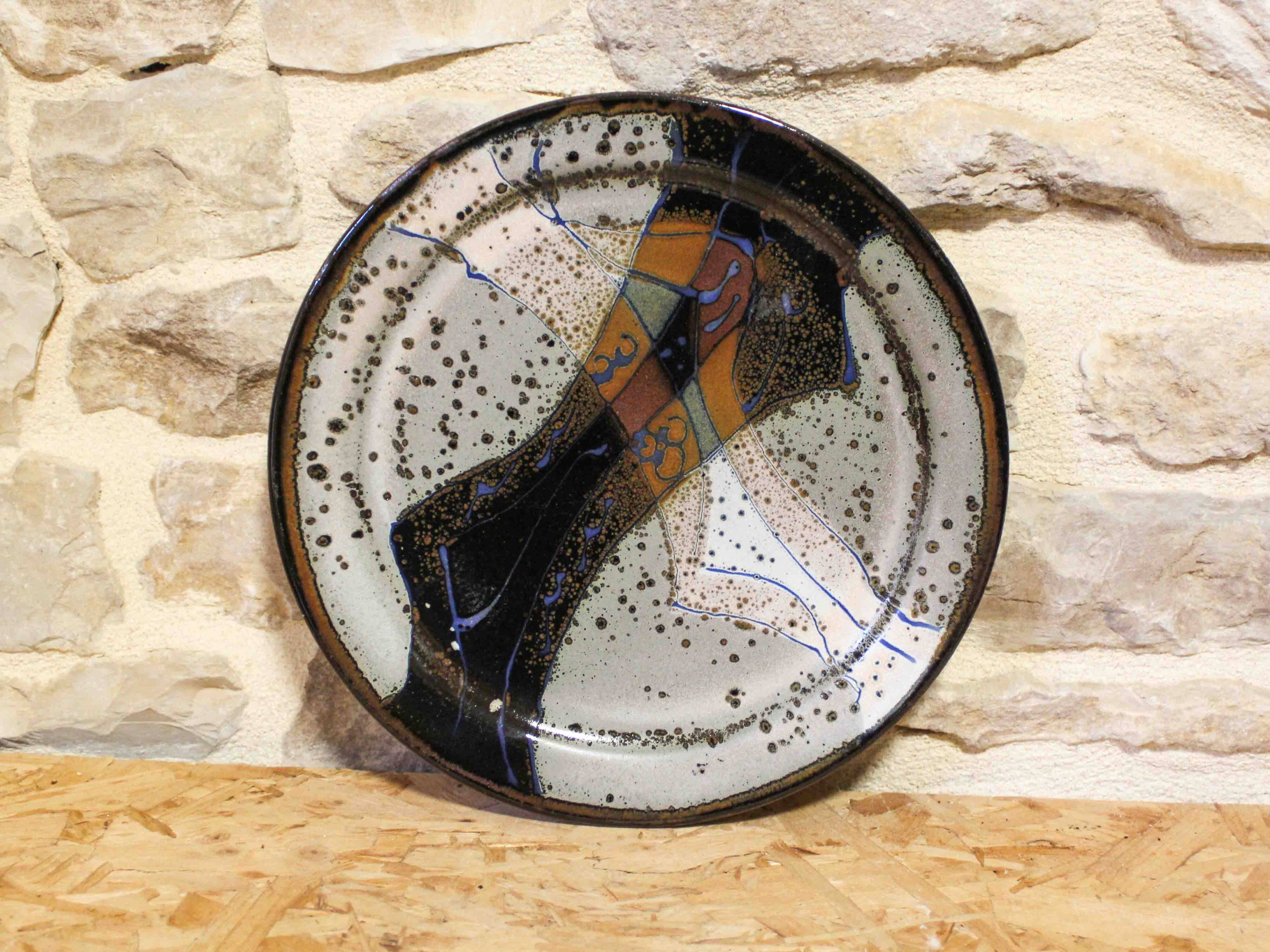Decorative glazed stoneware plate by Patrick Rollet
