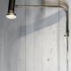 Minimalist metal wall light in the style of Jean Prouvé, circa 1950.