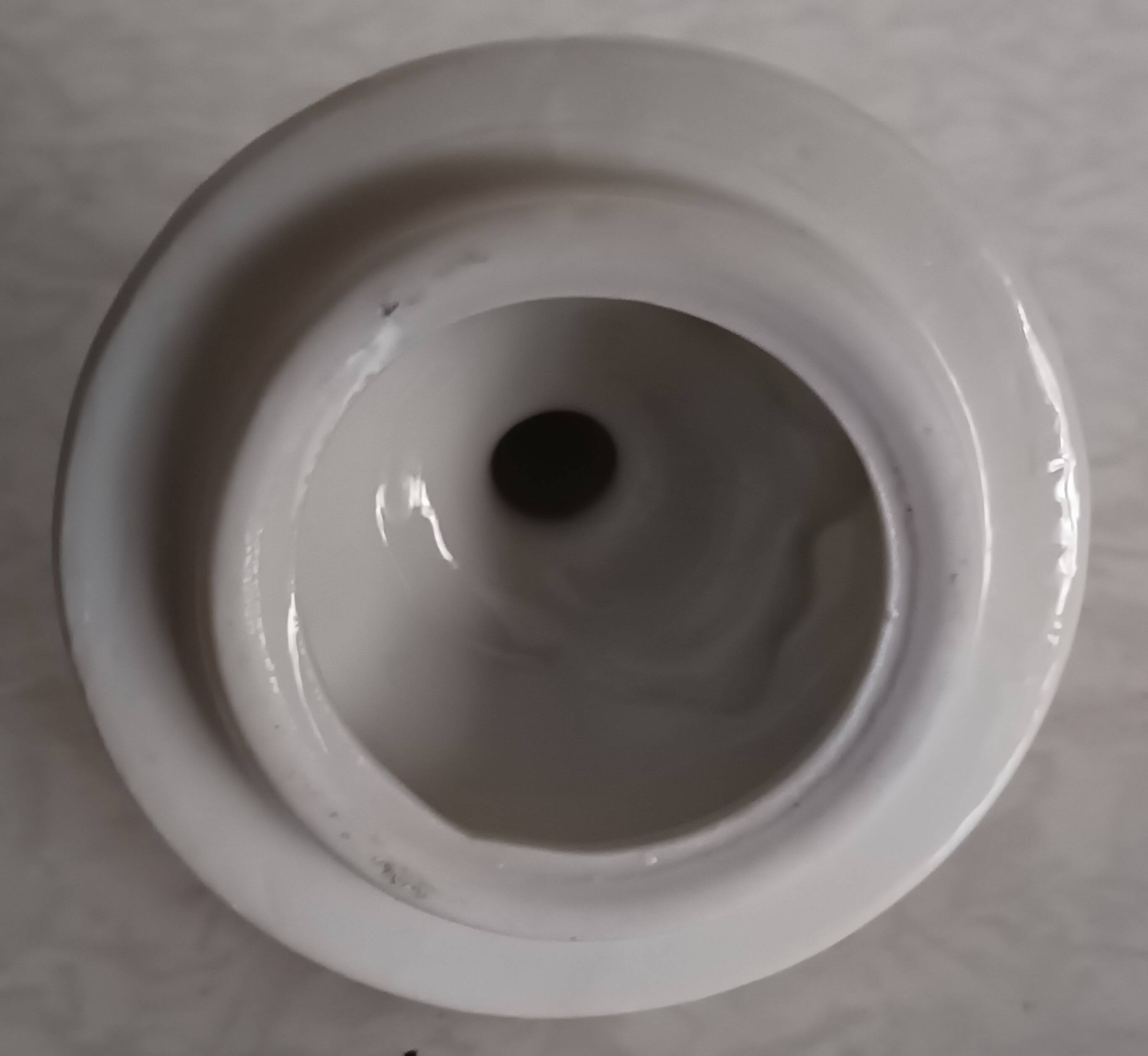 Golden porcelain teapot and coffee pot set with floral design and matching milk jug.