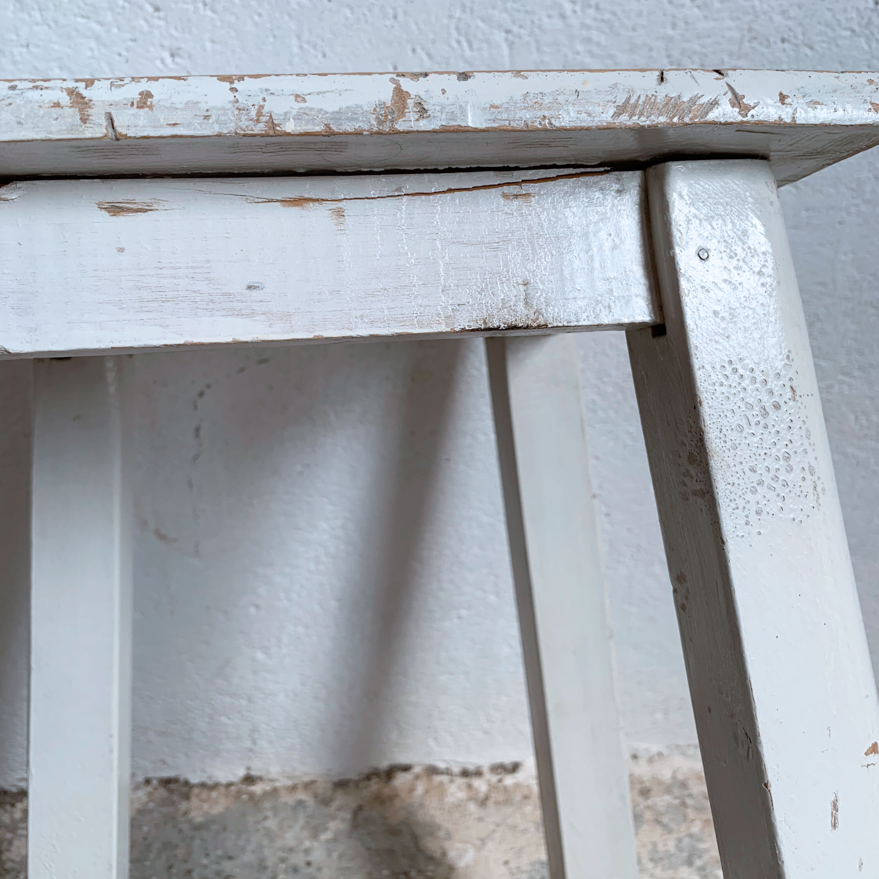 White wooden workshop stool