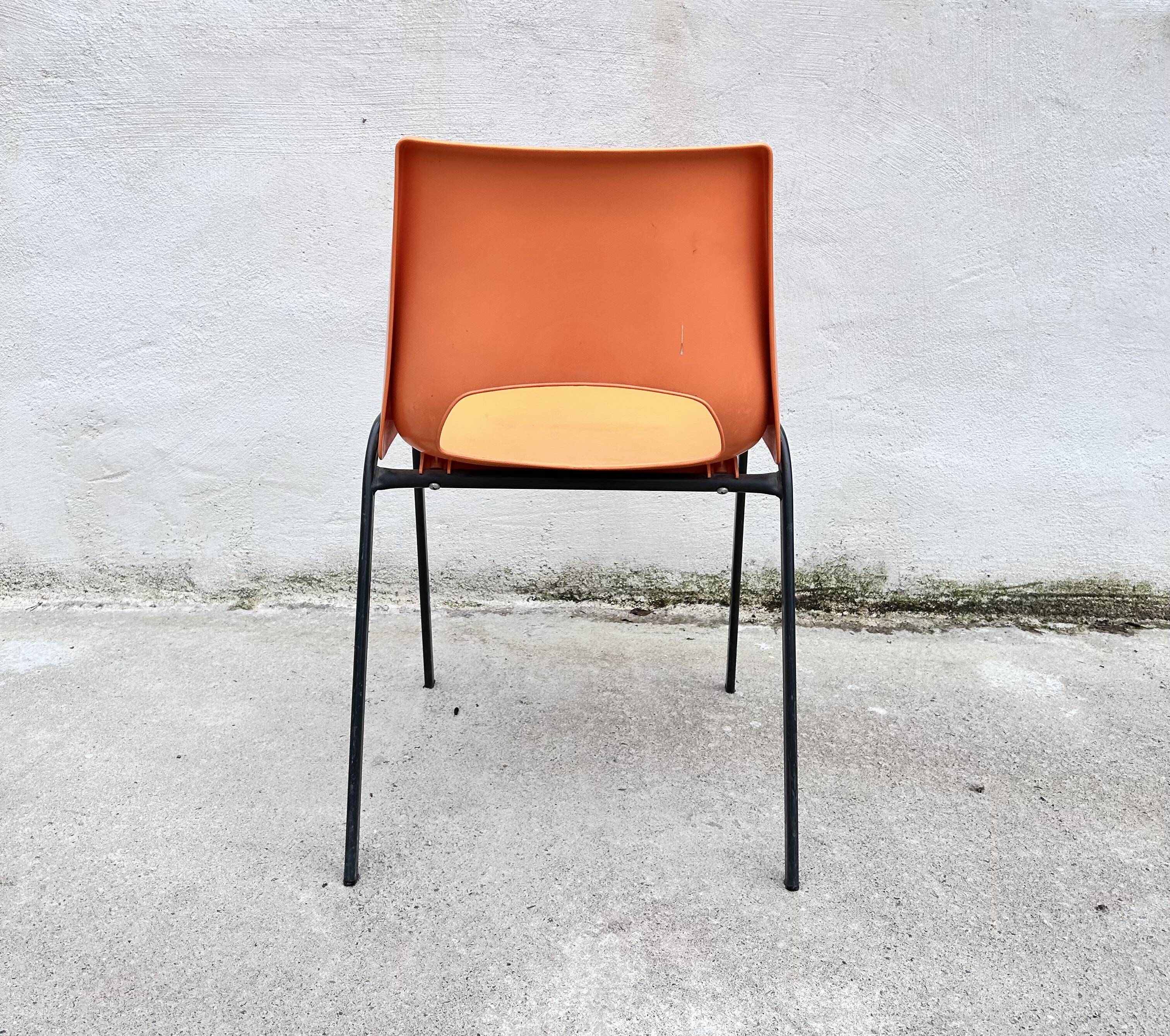 Orange plastic shell chair