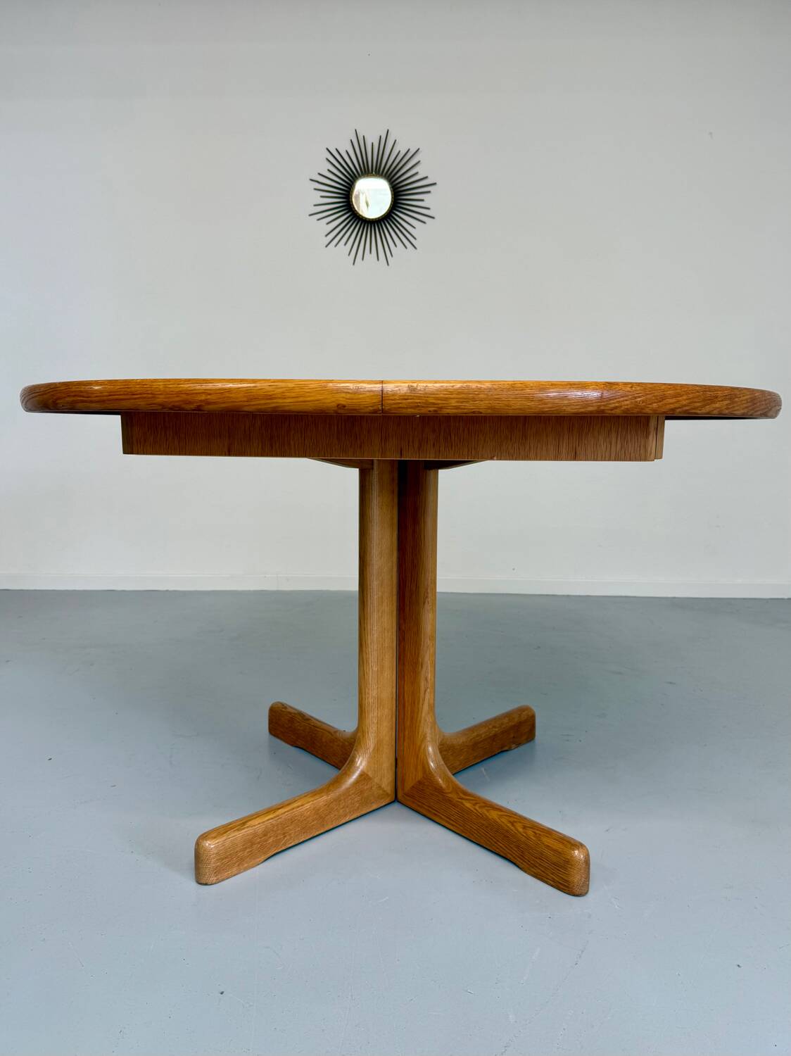 Antique round Scandinavian dining table from the 70s with 1 solid wood extension