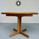 Antique round Scandinavian dining table from the 70s with 1 solid wood extension