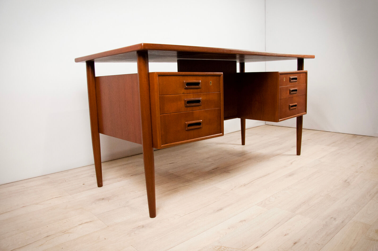 Teak desk by A. Vodder