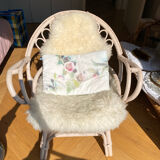 Shell chair in pale pink painted rattan