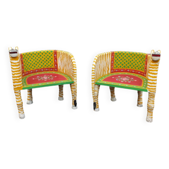 Pair of wooden armchairs with a "tiger" appearance