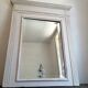 Beveled fireplace mirror