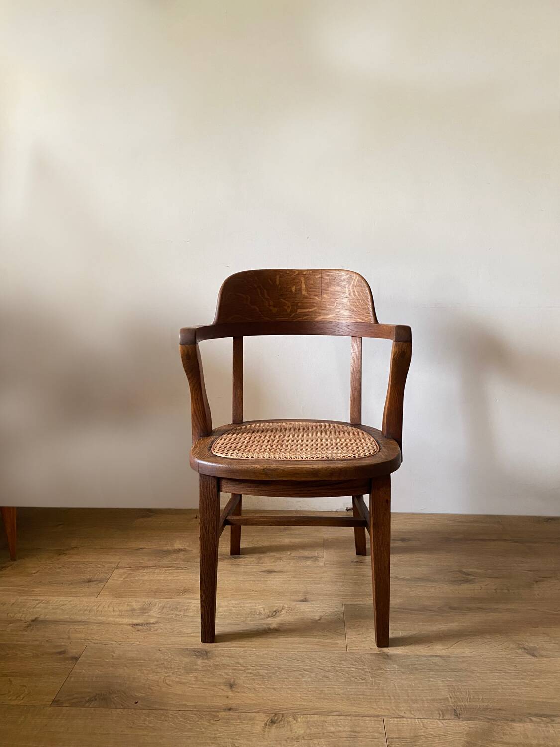 Solid oak and cane armchair